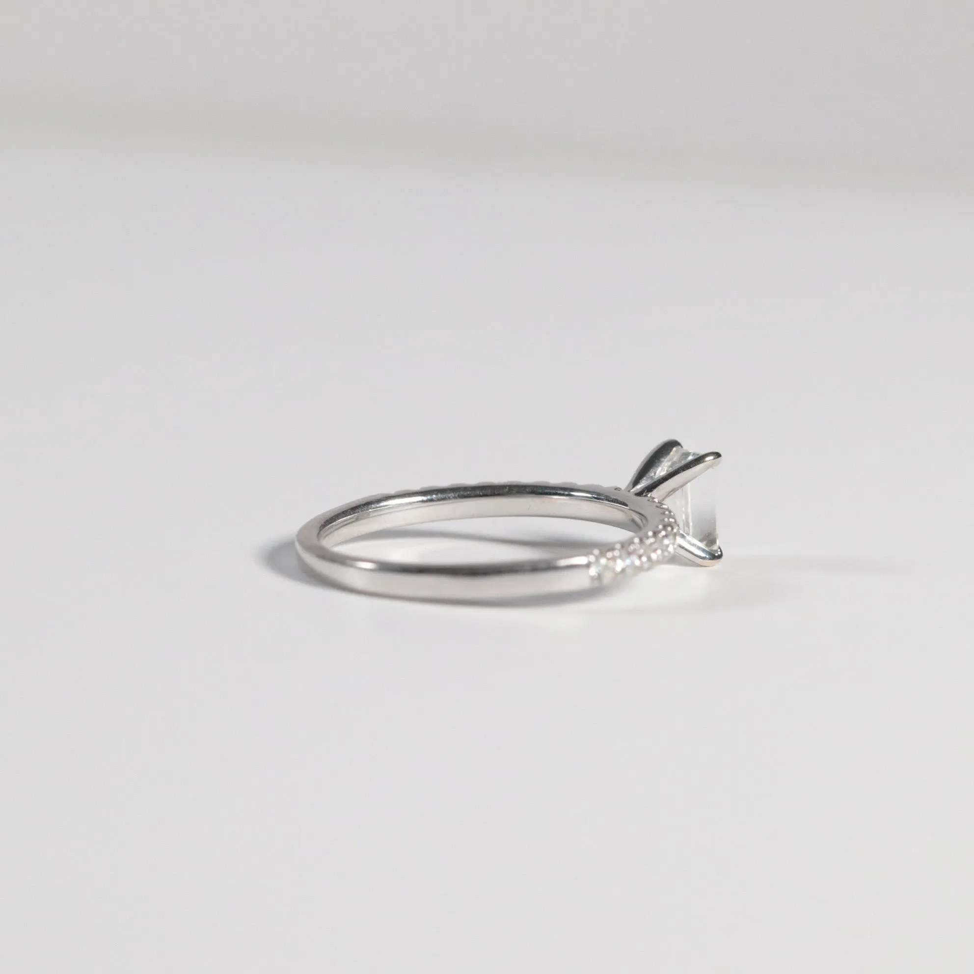 0.60 Emerald Cut Diamond with Accented Band