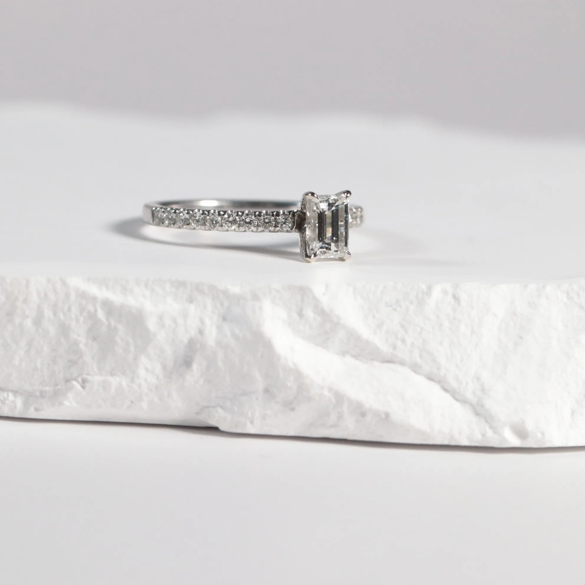 0.60 Emerald Cut Diamond with Accented Band