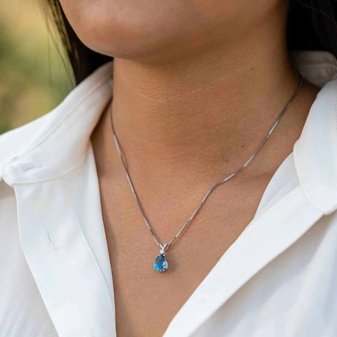 Elegant 3.00 CTW Topaz & Diamond Teardrop Solitaire Pendant in .925 Sterling Silver