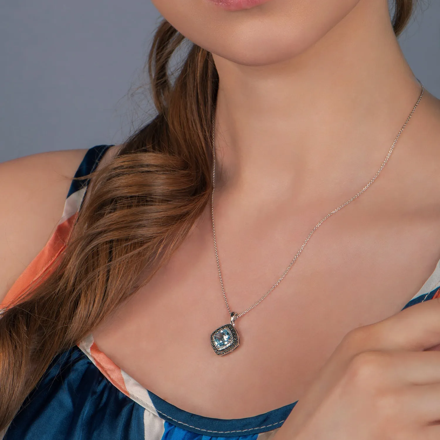 Jewelili Sterling Silver with Cushion Shape Sky Blue Topaz and Treated Black and Natural White Round Diamonds Pendant Necklace