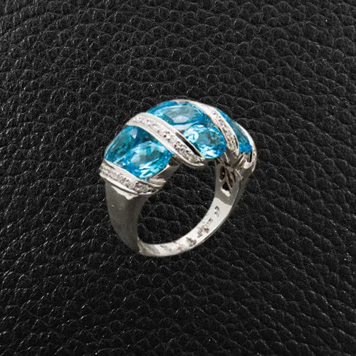 Oval Blue Topaz & Diamond Ring